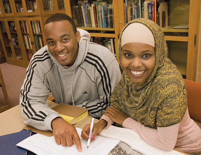 Two Western students studying in the library