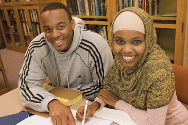 Two Western students studying in the library